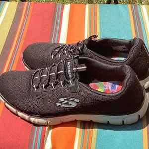 Sketchers slip on athletic shoes